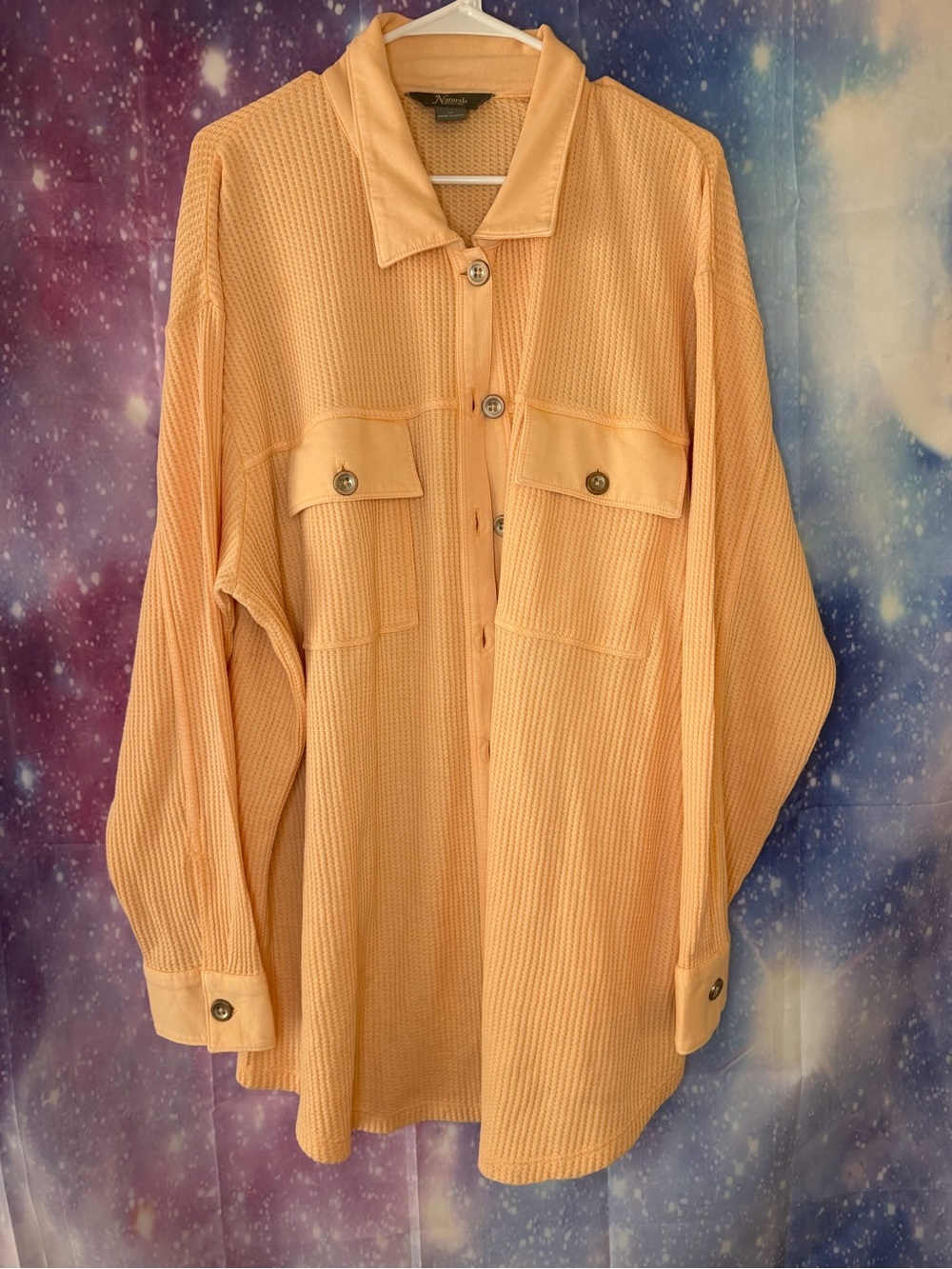 oversized peach-colored waffle-knit button-down shacket